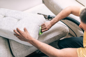 process deep furniture cleaning removing dirt from sofa washing concept